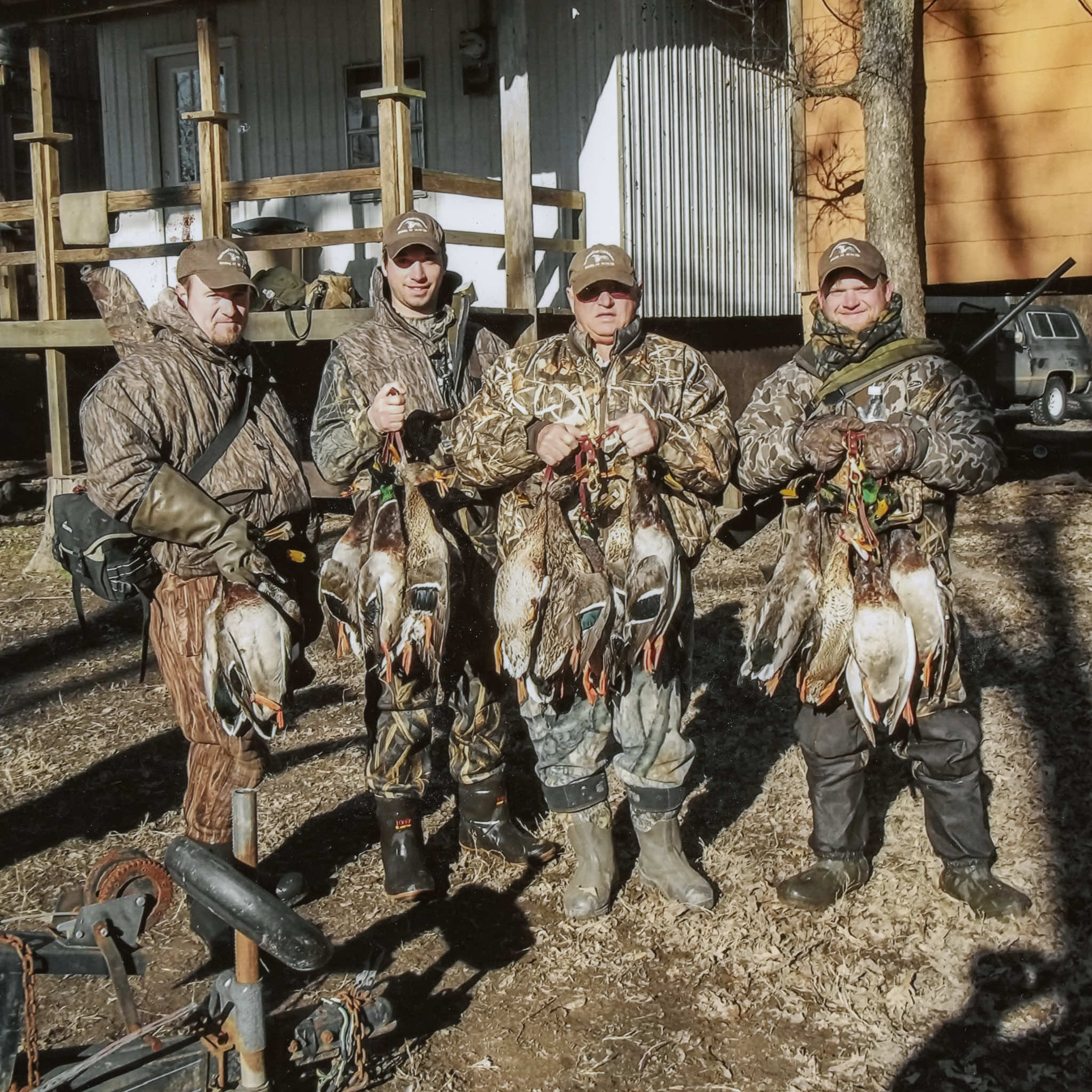 Happy hunters at Two Rivers Duck club after a successful Arkansas flooded green timber hunt